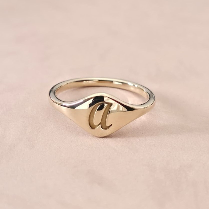 Behind the Scenes in NYC: Crafting the Perfect Cursive Initial Ring