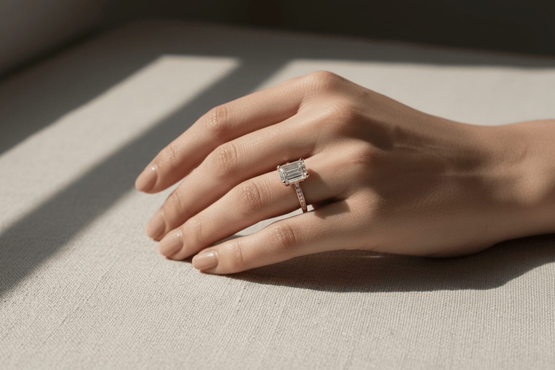 1ct emerald cut engagement ring worn on hand showing balanced size and elegant proportions