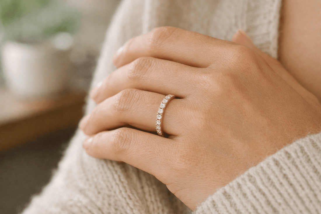 Women wearing a diamond wedding band designed for daily wear in 14k yellow gold