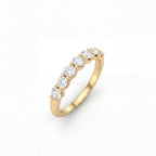 1/3 Eternity Round Lab-Grown Diamond Band in 14K yellow gold, angled view showing graduated round diamonds