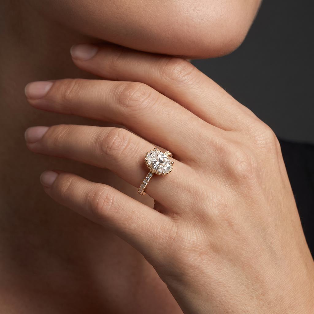 1.5 carat oval Lab-Grown Diamond engagement ring worn on hand, 14K rose gold with pavé band, shown for scale