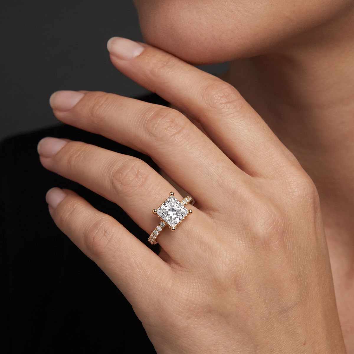 1.5 carat princess cut Lab-Grown Diamond engagement ring worn on hand, 14K rose gold with pavé band, shown for scale
