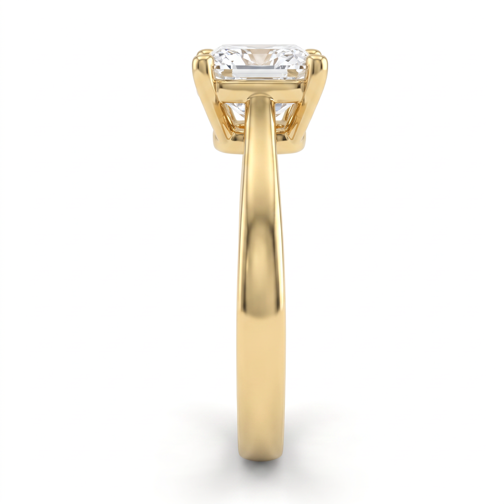 1.5ct cushion cut solitaire in 14K yellow gold viewed along the 2.5mm shank, basket and gallery visible from the side