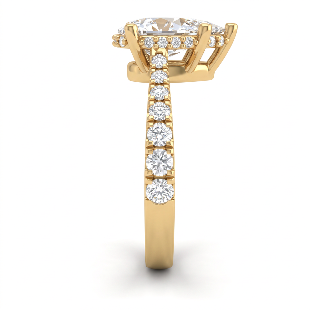 Close-up of the hidden halo and pavé shoulders on a 14K yellow gold 1.5ct Pear Cut Lab-Grown Diamond engagement ring