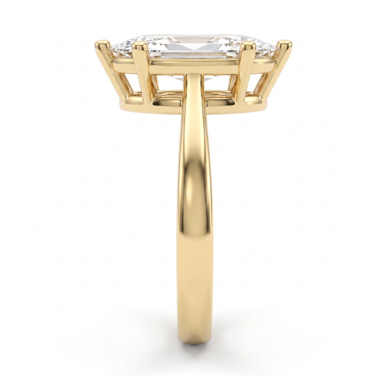 1.5ct marquise solitaire in 14K yellow gold viewed along the 2.5mm shank, basket and gallery visible from the side