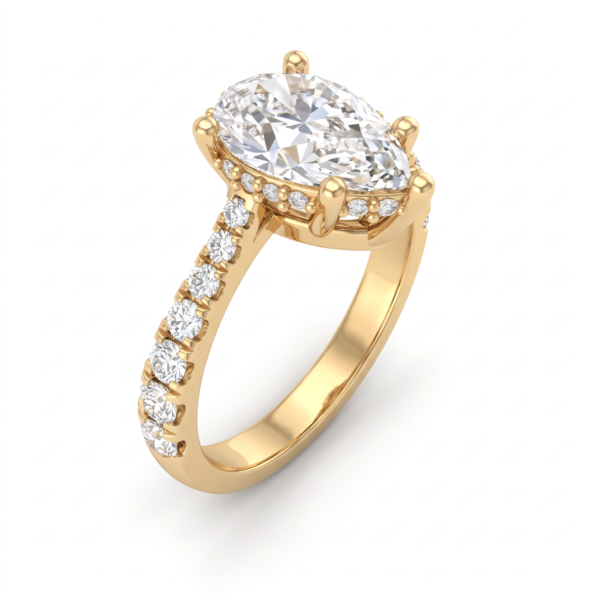 1.5ct Pear Cut Lab-Grown Diamond hidden halo engagement ring in 14K yellow gold with a pavé band, angled view