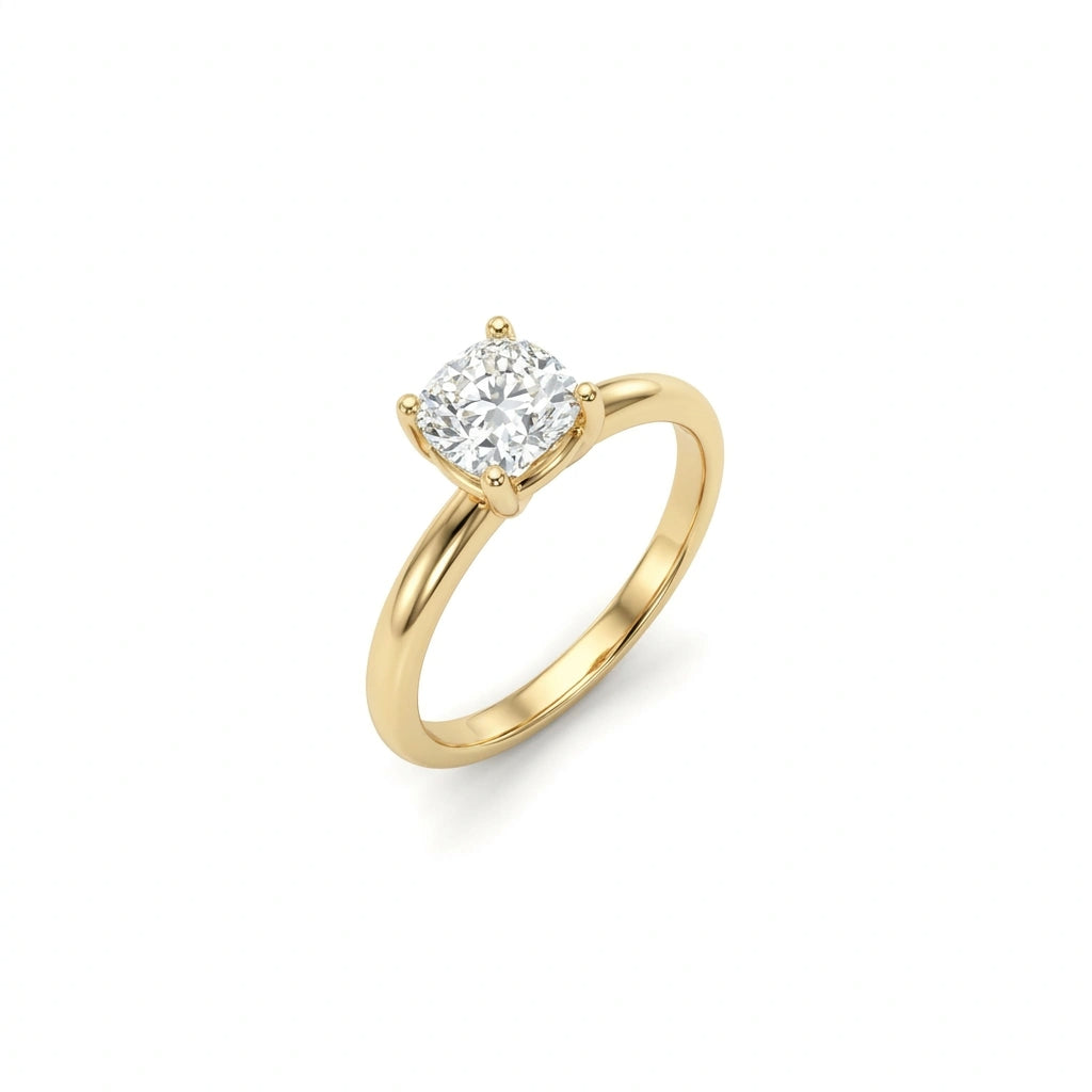 Angled view of 1 carat cushion cut lab grown diamond engagement ring in 14K yellow gold