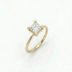 Angled view of 1 carat princess cut lab grown diamond engagement ring in 14K yellow gold