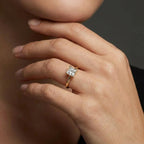 1 carat princess cut lab grown diamond engagement ring in 14K yellow gold worn on hand