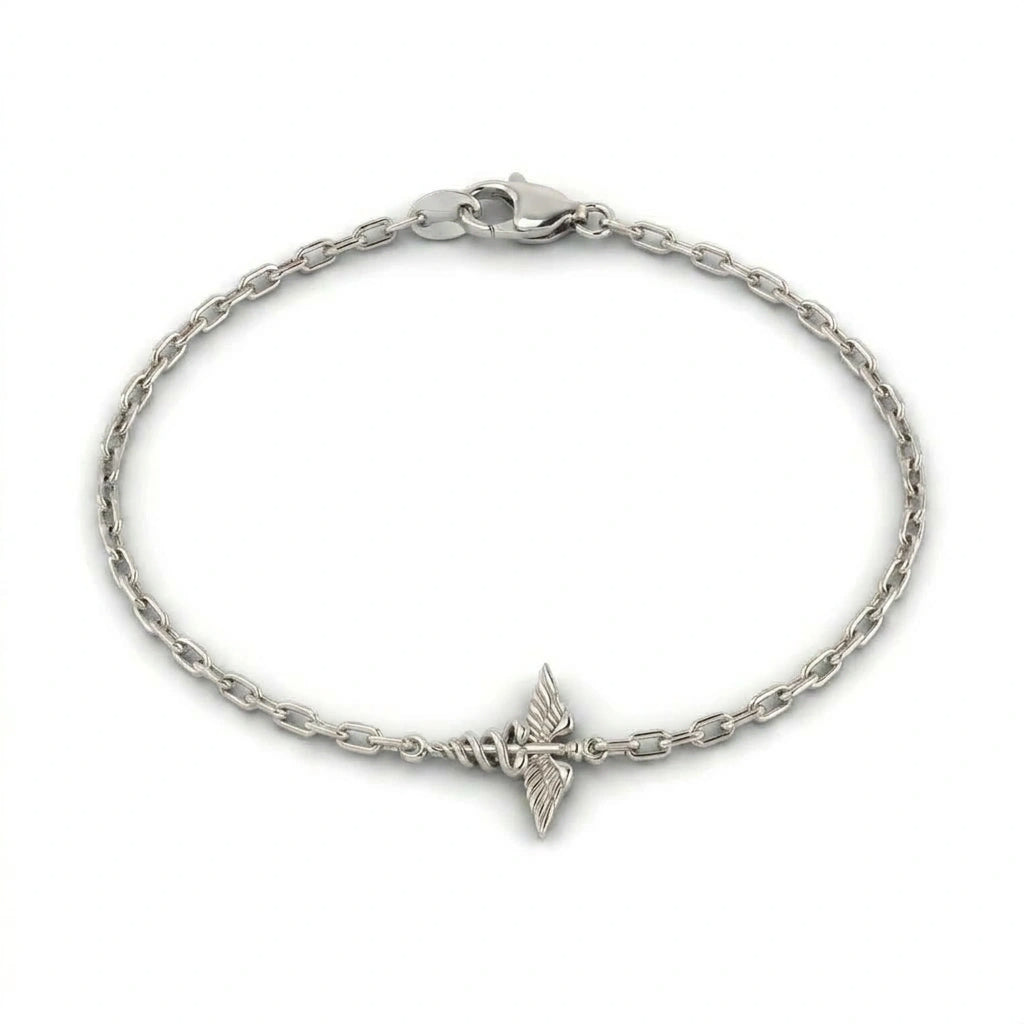 14K white gold caduceus charm bracelet on cable link chain — product view on white background — Black Pearl of Queens