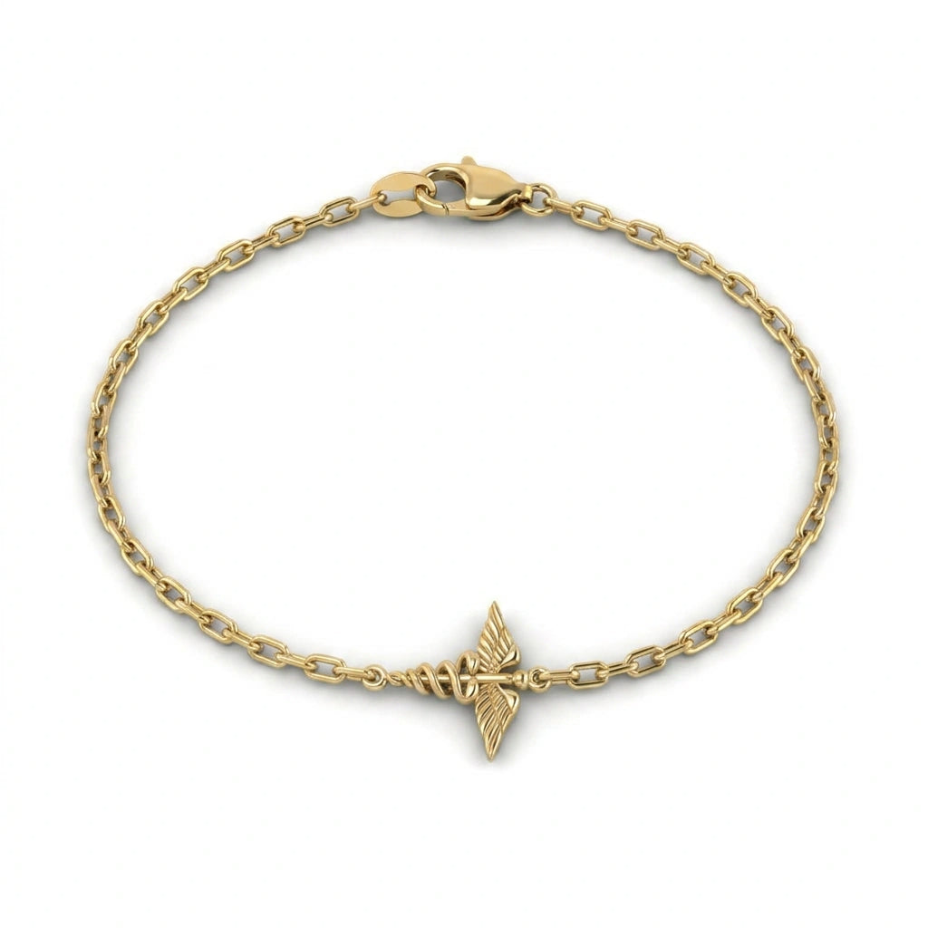 14K yellow gold caduceus charm bracelet on cable link chain — product view on white background — Black Pearl of Queens