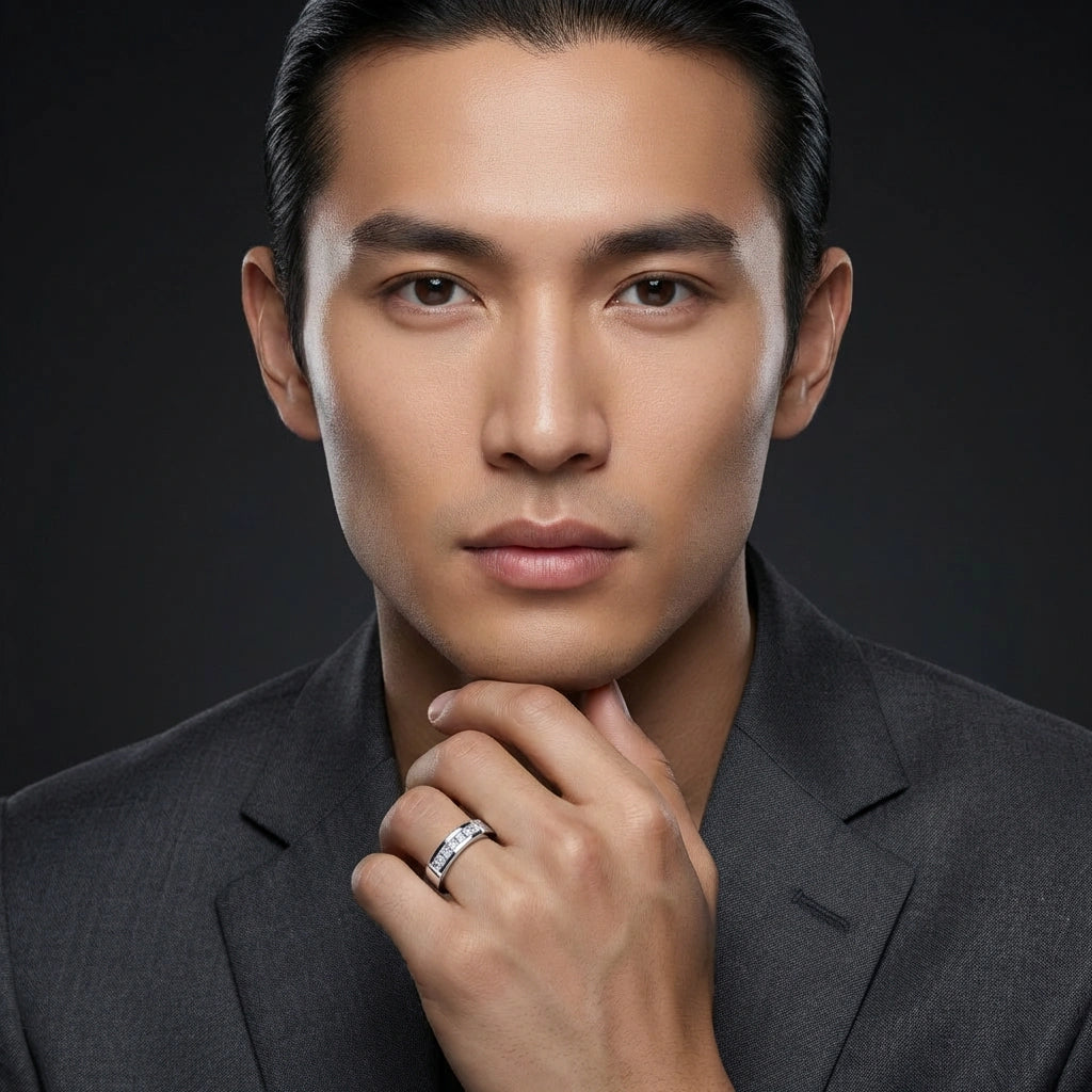 14K gold men’s diamond wedding band with square channel-set diamonds worn on hand