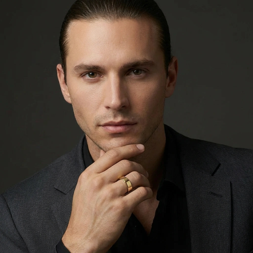 Man wearing 14K yellow gold polished wedding band in portrait view