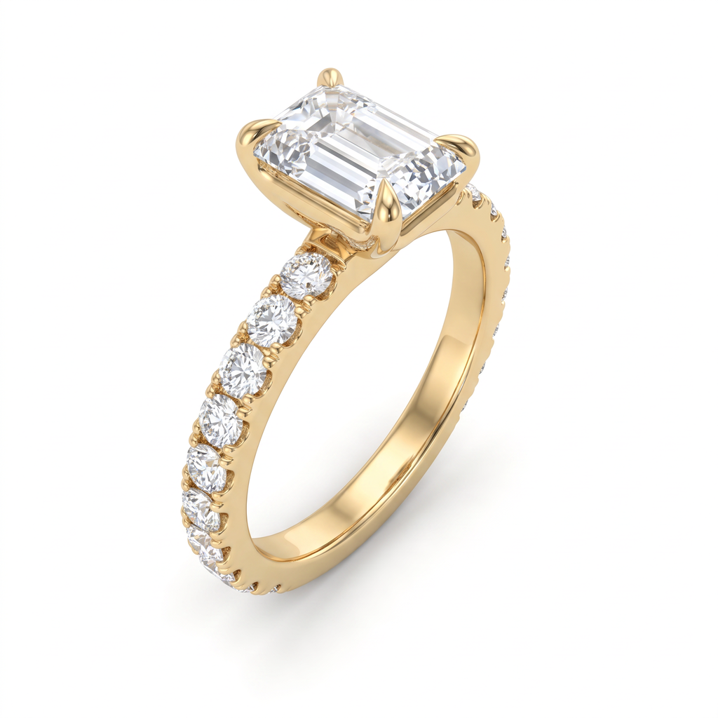 1ct emerald cut French pave engagement ring in 14K yellow gold, angled view showing four claw prongs and pave shoulders