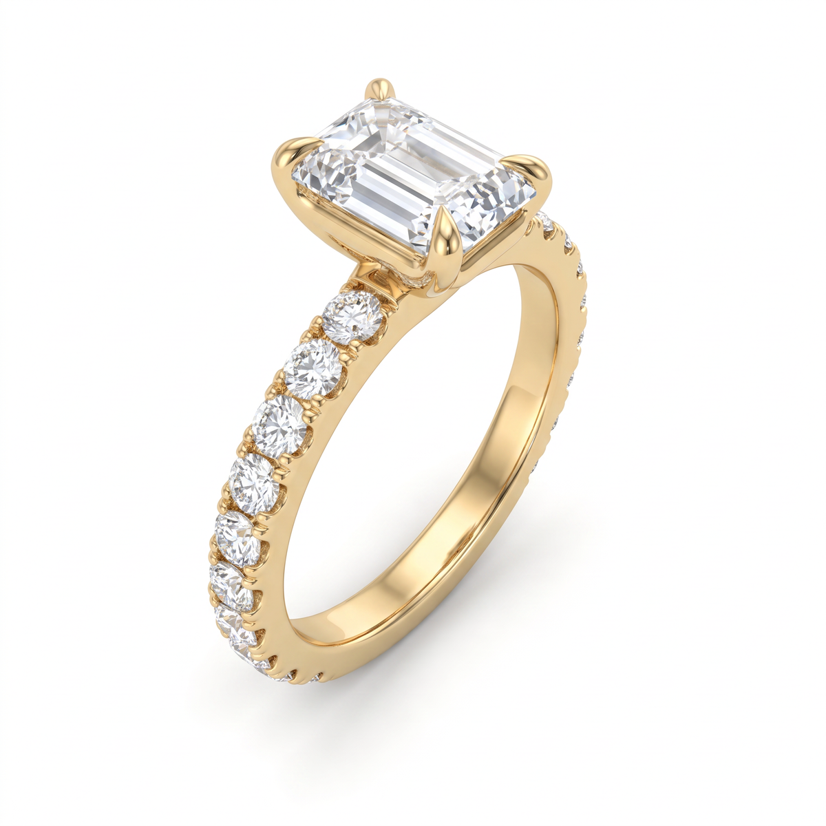 1ct emerald cut French pave engagement ring in 14K yellow gold, angled view showing four claw prongs and pave shoulders