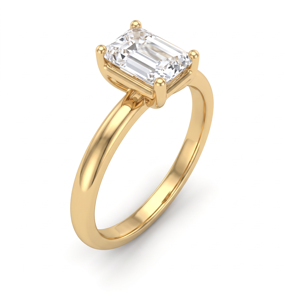 1ct emerald cut solitaire engagement ring in 14K yellow gold, angled view showing four-prong setting and slim band
