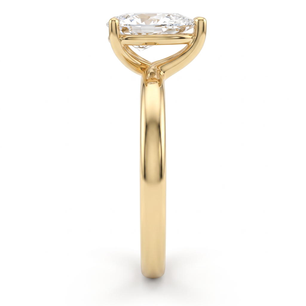 Side profile of 1ct pear solitaire engagement ring in 14K yellow gold showing setting height and open basket