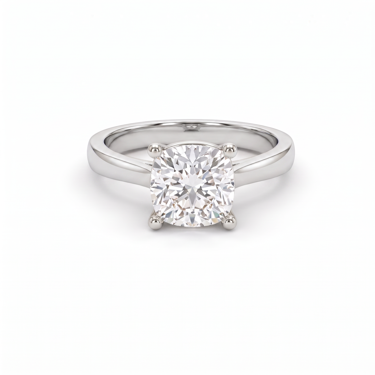 2.5ct cushion cut diamond solitaire in 14K white gold, front view, four-prong head on a 2.5mm shank