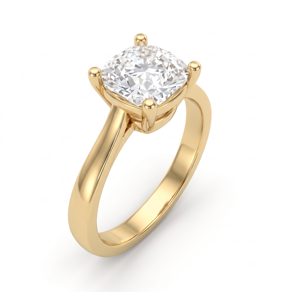 Three-quarter view of the 2.5ct cushion cut solitaire in 14K yellow gold, four-prong basket above the gallery