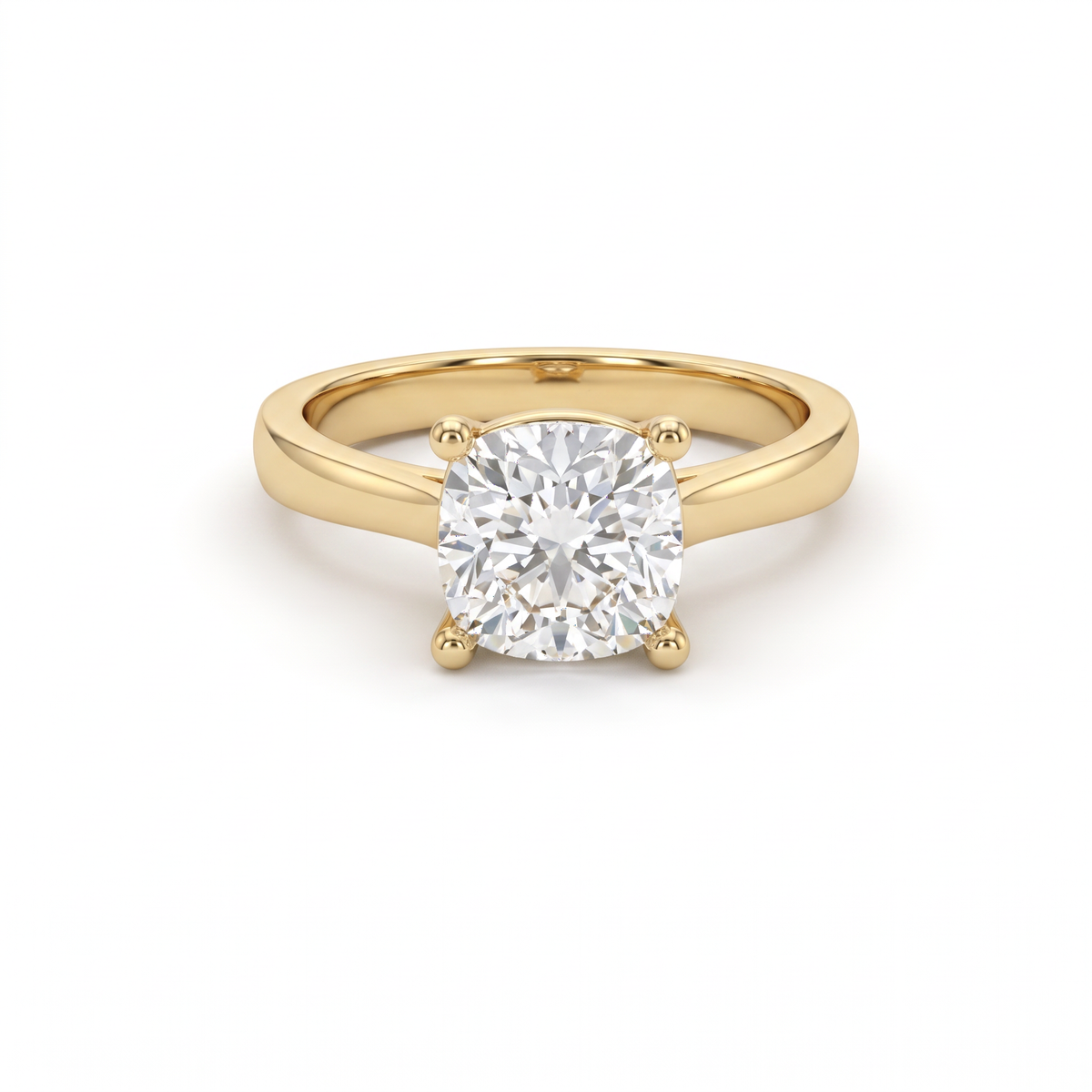 2.5ct cushion cut diamond solitaire in 14K yellow gold, front view, four-prong head on a 2.5mm shank