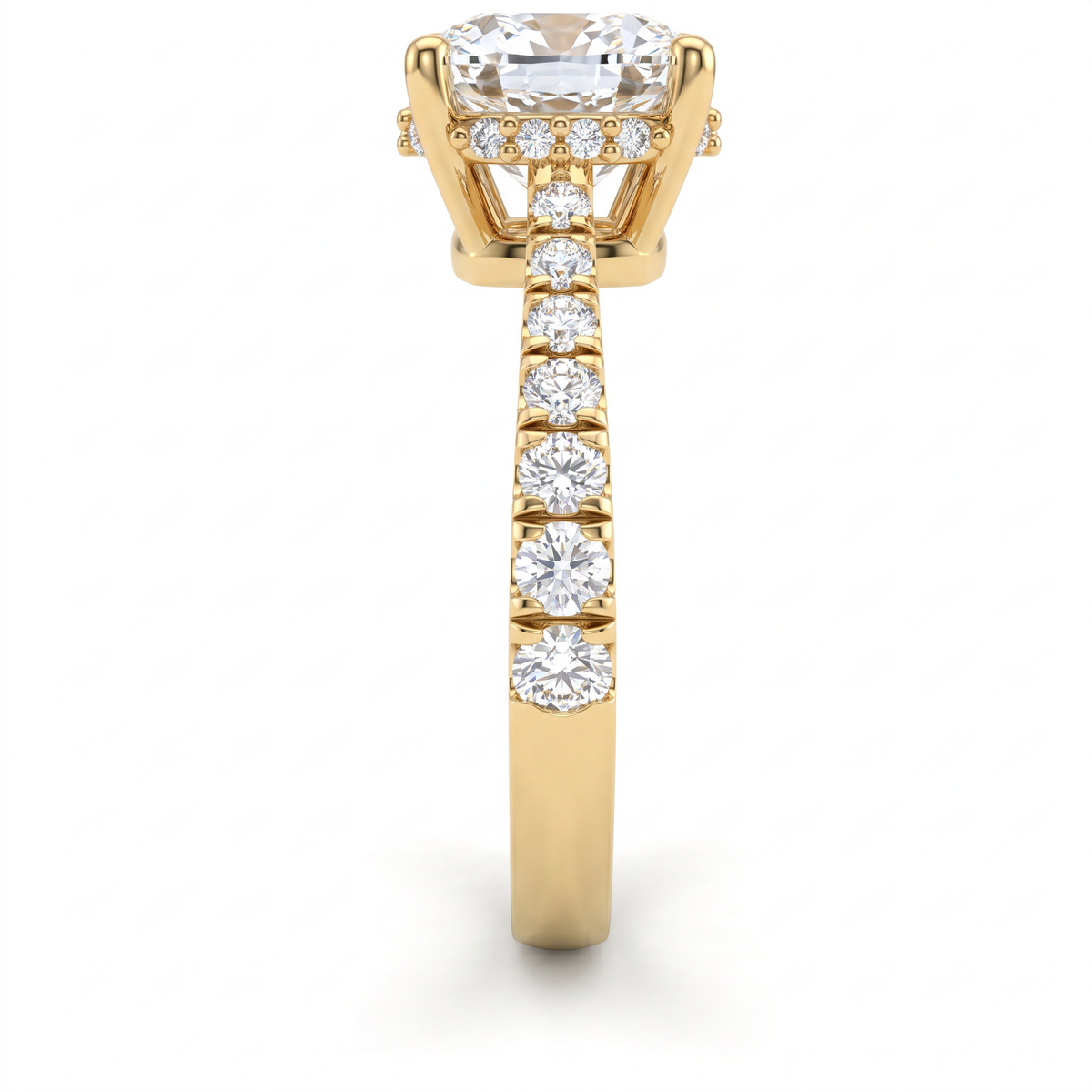 Side view of a 2.5ct cushion engagement ring in 14K yellow gold with graduated pavé Lab-Grown Diamond band and hidden halo basket