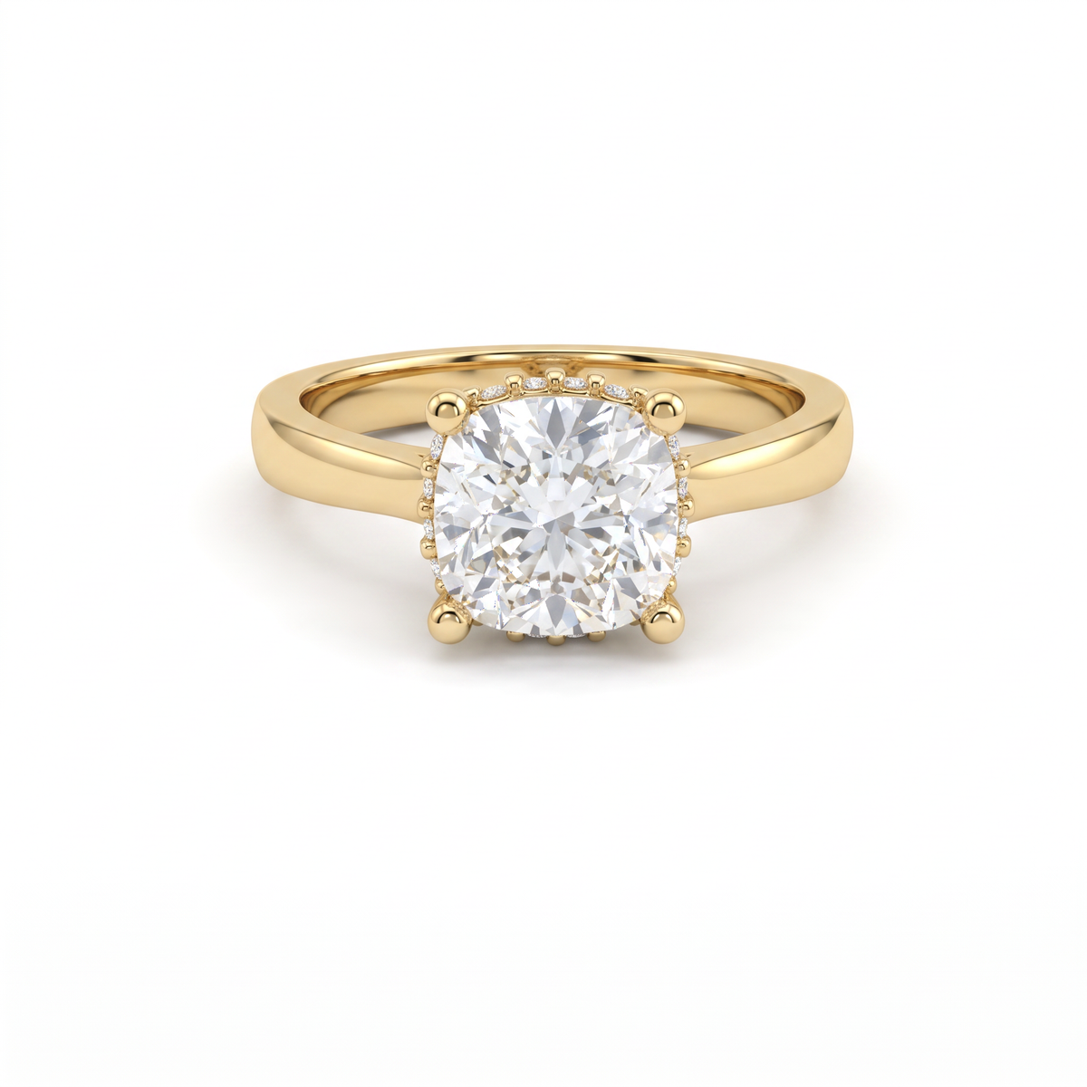 2.5ct cushion cut diamond with hidden halo in 14K yellow gold, front view, four-prong head on a 2.5mm shank