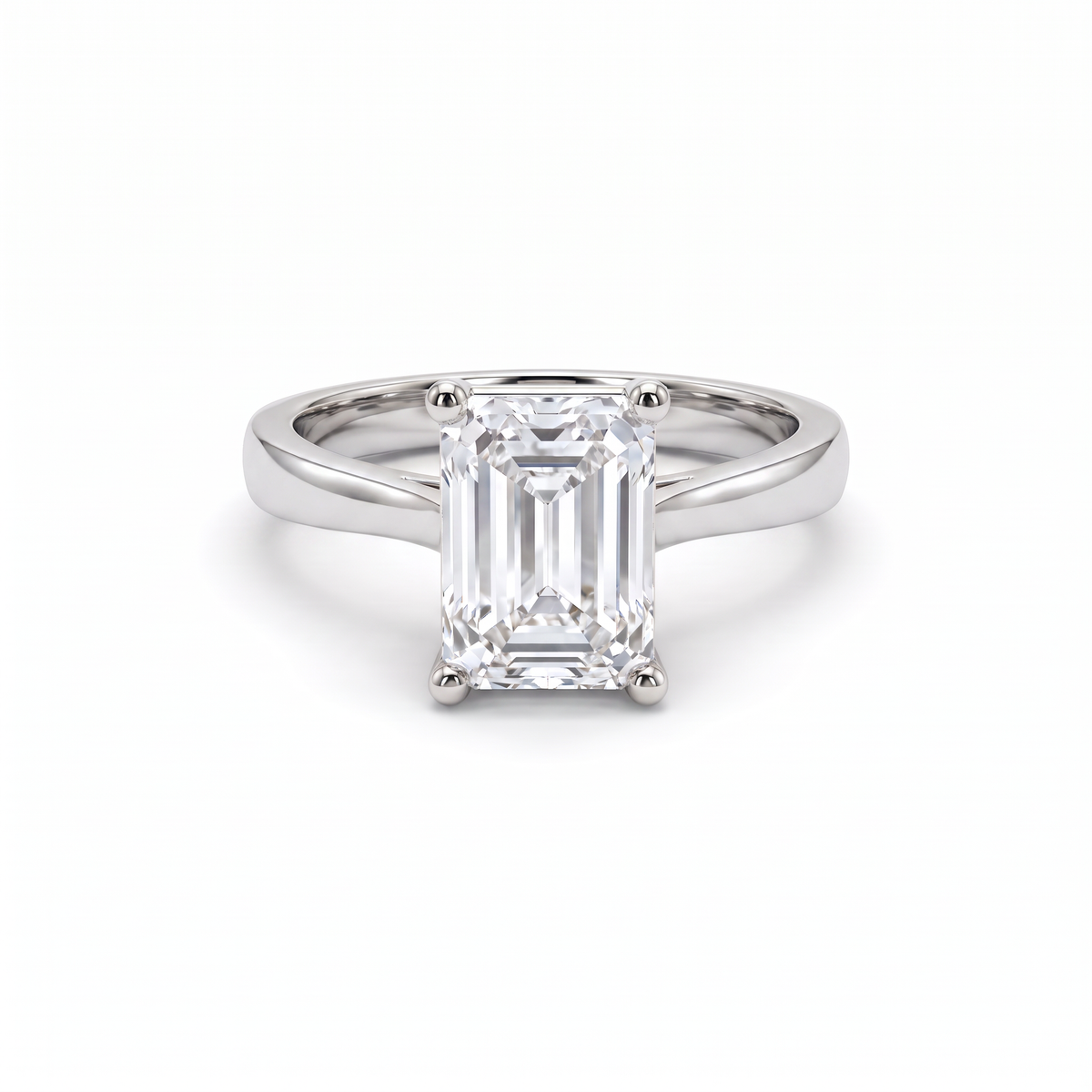 2.5ct emerald cut diamond solitaire in 14K white gold, front view, four-prong head on a 2.5mm shank
