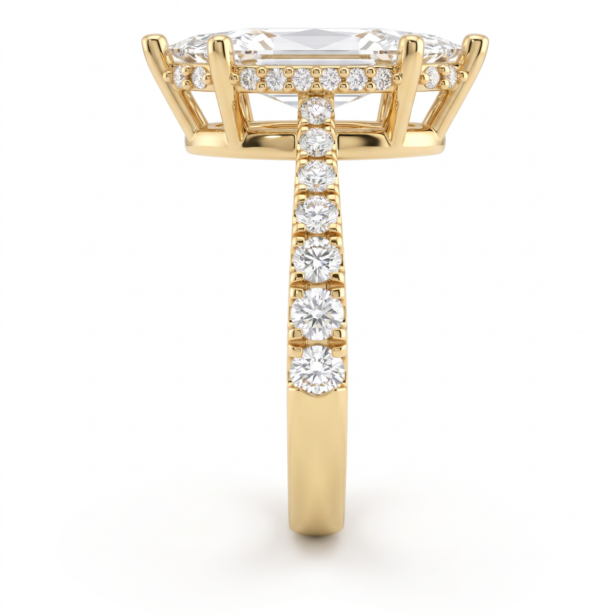 Side view of a 2.5ct marquise engagement ring in 14K yellow gold with graduated pavé Lab-Grown Diamond band and hidden halo basket