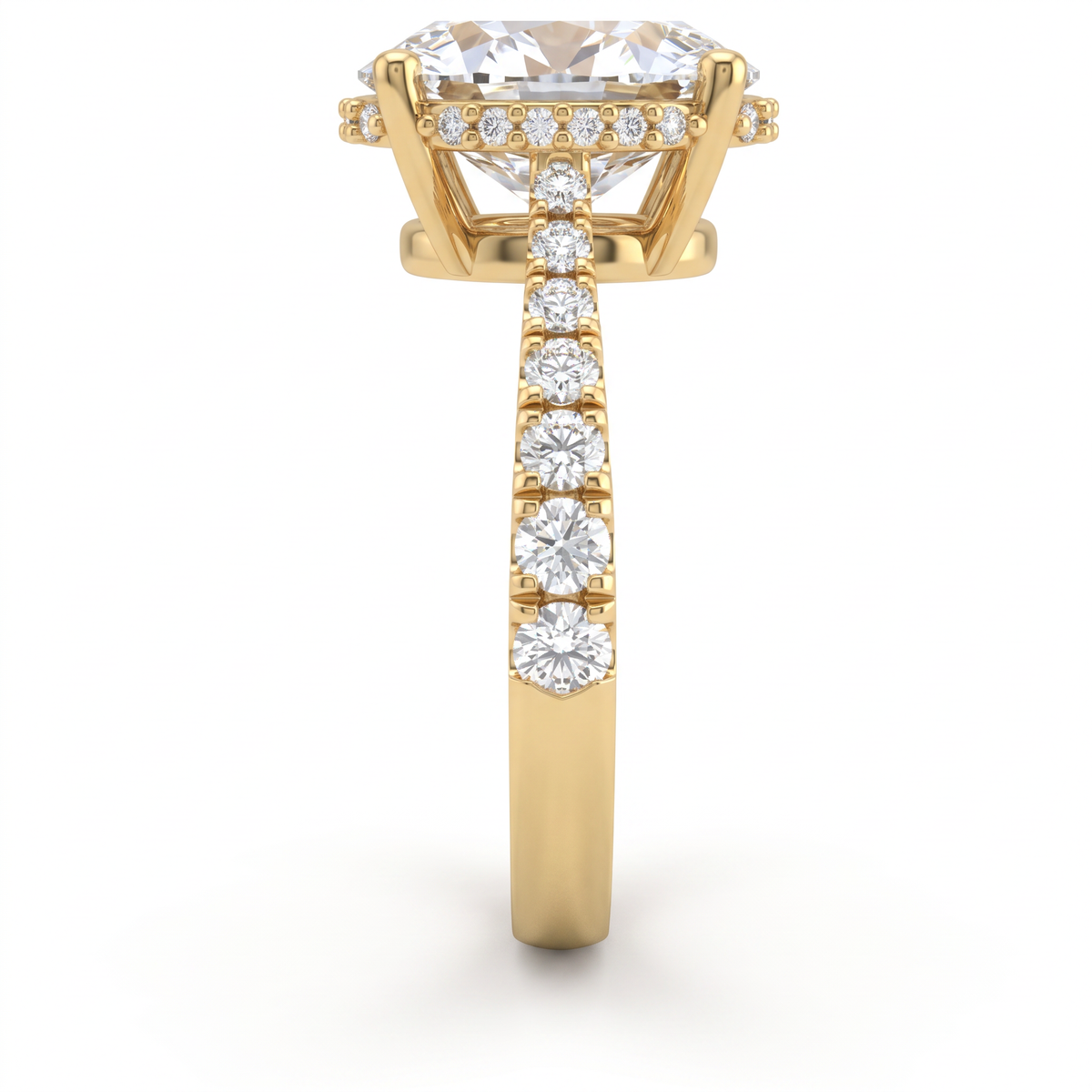 Side view of a 2.5ct oval engagement ring in 14K yellow gold with graduated pavé Lab-Grown Diamond band and hidden halo basket