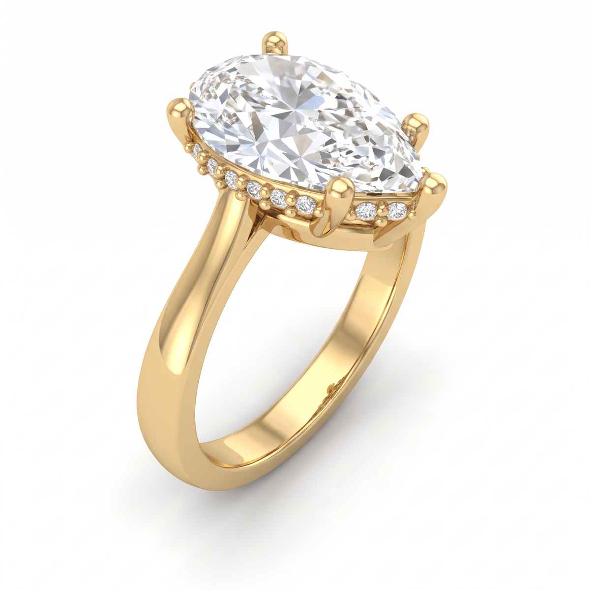 Angled view of a 2.5 carat pear cut Lab-Grown Diamond engagement ring in 14K yellow gold