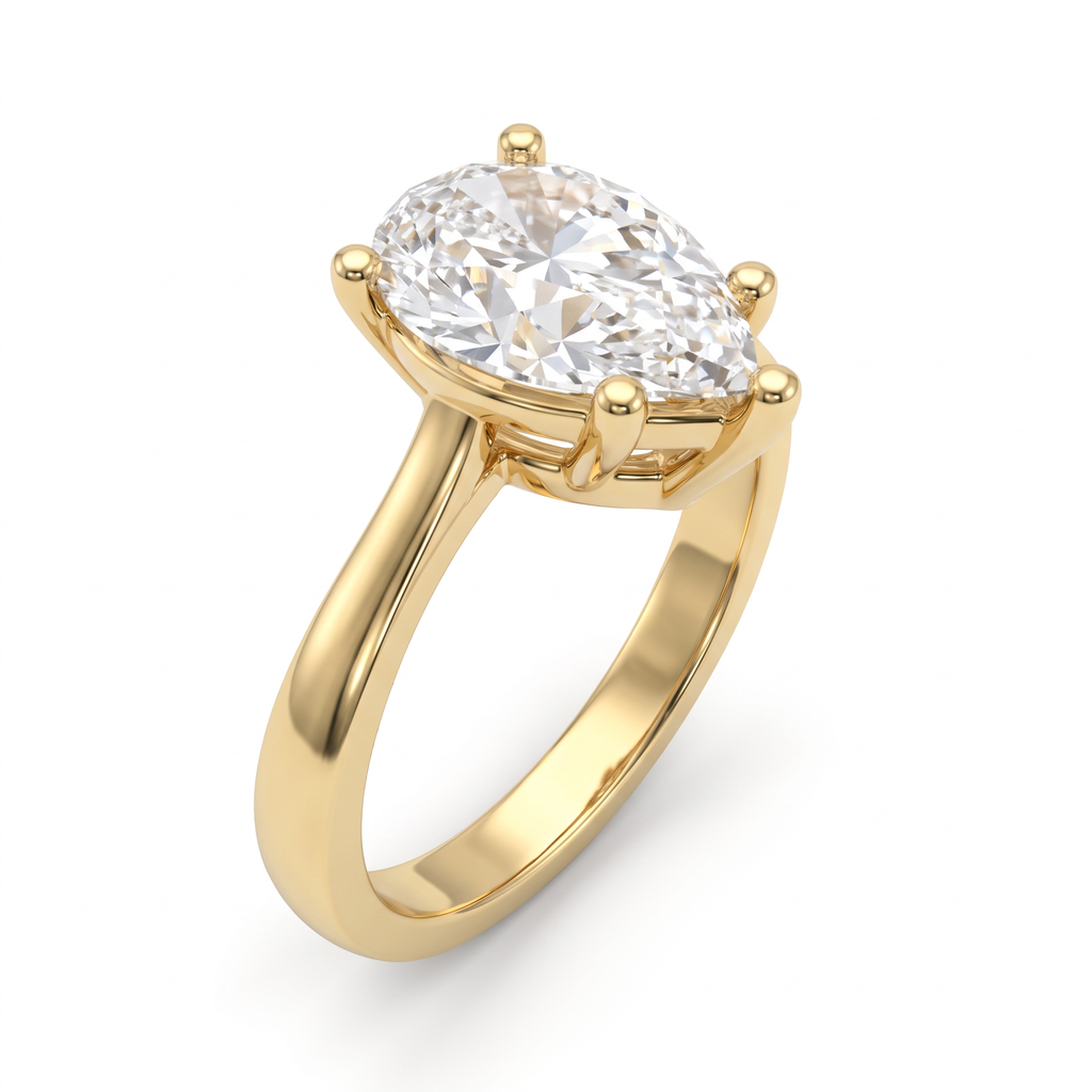 Three-quarter view of the 2.5ct pear solitaire in 14K yellow gold, five-prong basket above the gallery