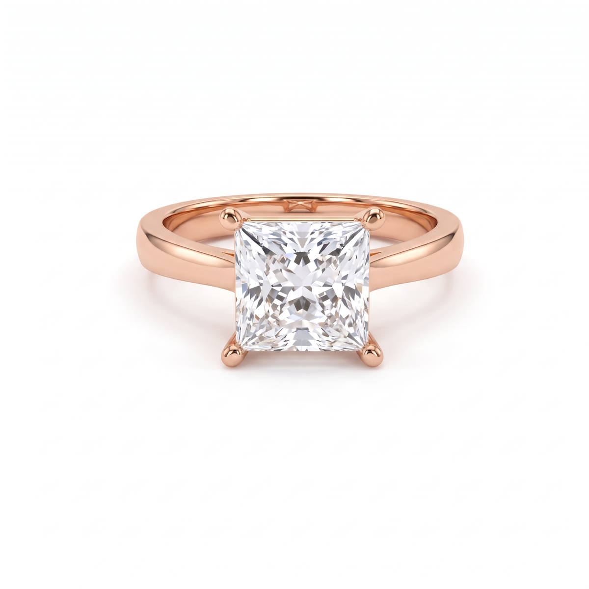 2.5ct princess cut diamond solitaire in 14K rose gold, front view, four corner prongs on a 2.5mm shank