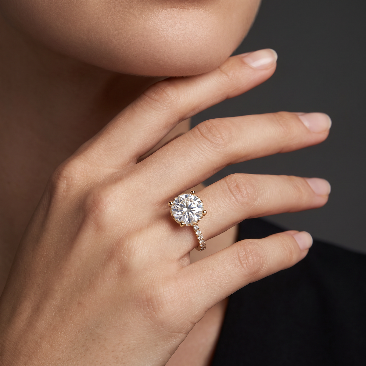 2.5ct Round Brilliant Lab-Grown Diamond engagement ring worn on the hand, showing the 14K gold pavé band on the finger
