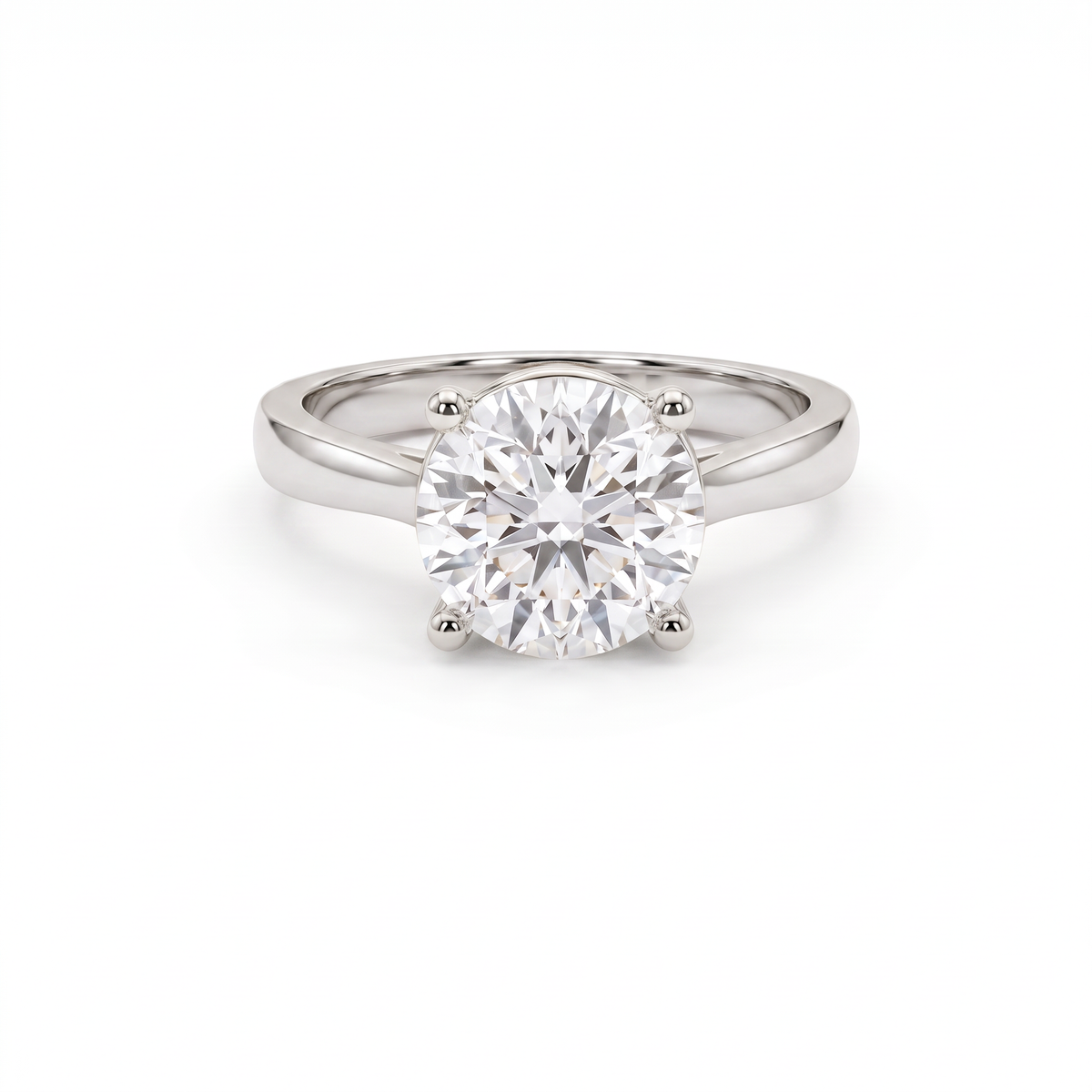 2.5ct round brilliant diamond solitaire in 14K white gold, front view, four-prong head on a 2.5mm shank