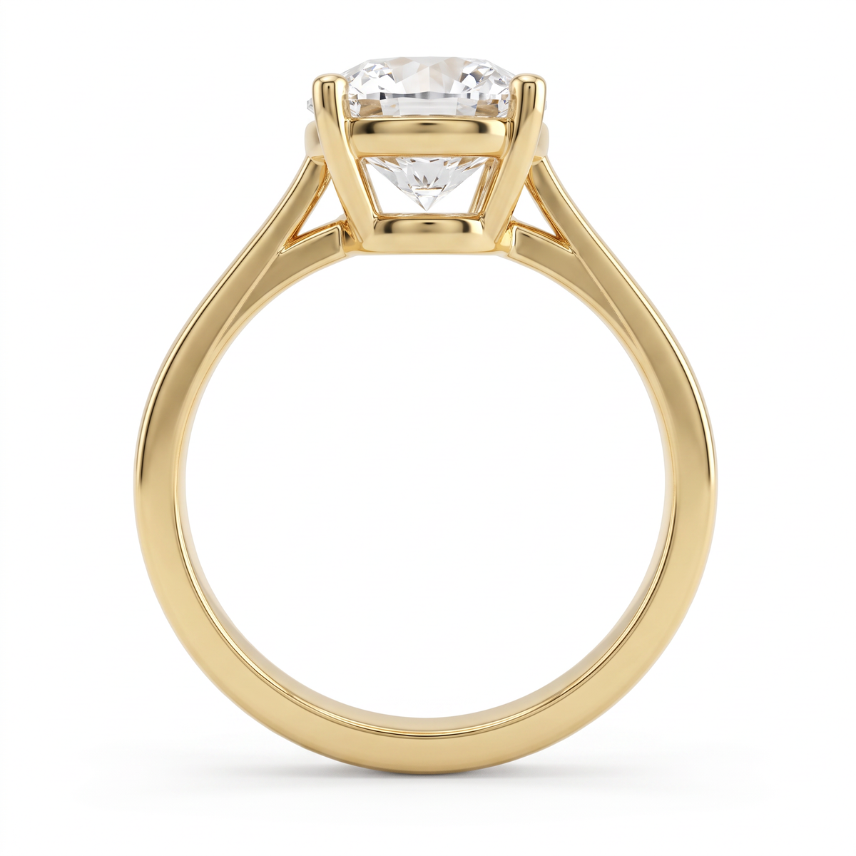 Side profile of the 2.5ct round solitaire in 14K yellow gold, showing the second gallery beneath the basket