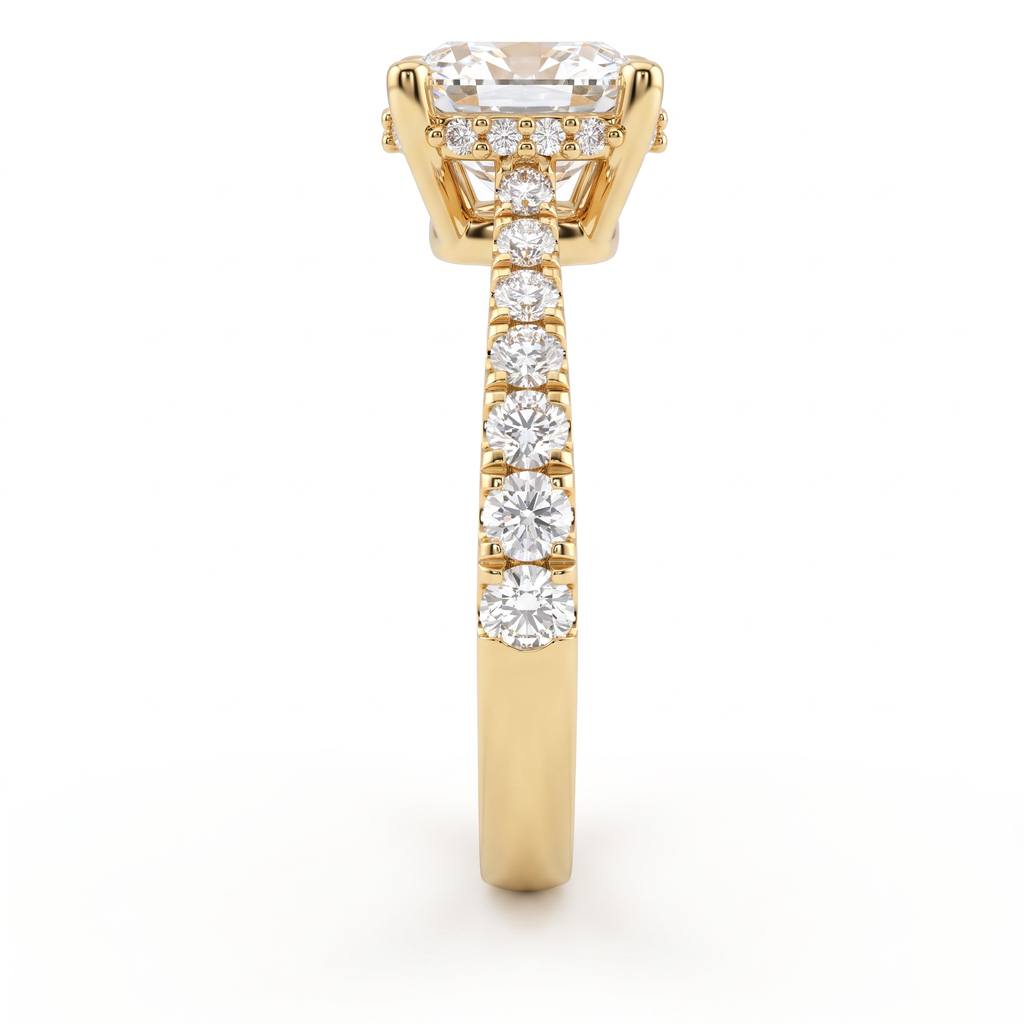 Side view of a 2ct cushion engagement ring in 14K yellow gold with graduated pavé Lab-Grown Diamond band and hidden halo basket