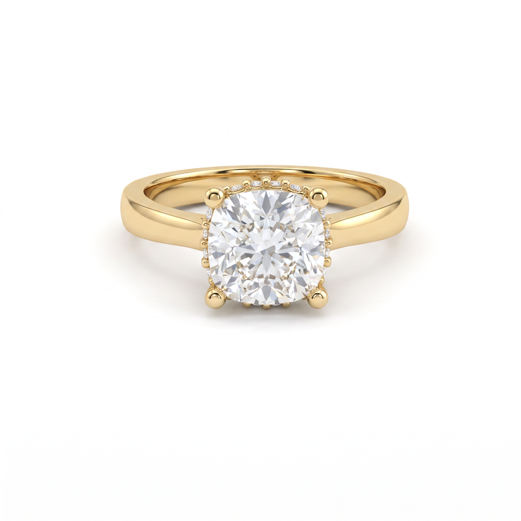 2ct cushion cut diamond with hidden halo in 14K yellow gold, front view, four-prong head on a 2.5mm shank
