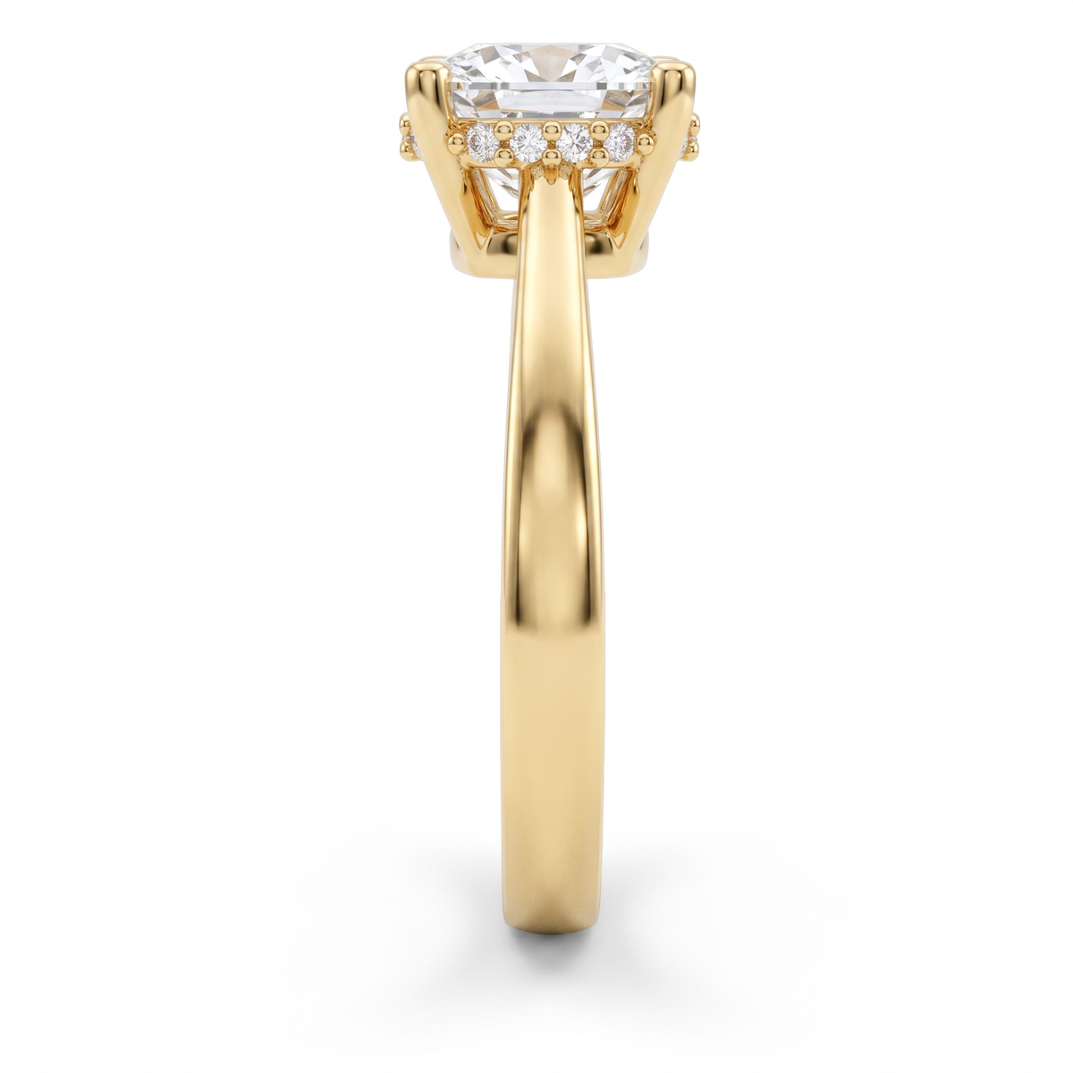 2ct cushion hidden halo ring in 14K yellow gold viewed along the 2.5mm shank, halo and basket visible from the side