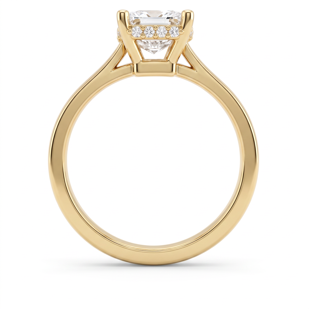 Profile of a 2ct emerald cut hidden halo engagement ring in 14K yellow gold, four-prong setting