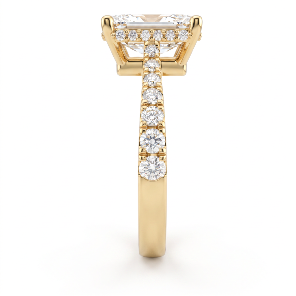2ct emerald cut Lab-Grown Diamond engagement ring in 14K yellow gold, side view detail of pavé band and hidden halo