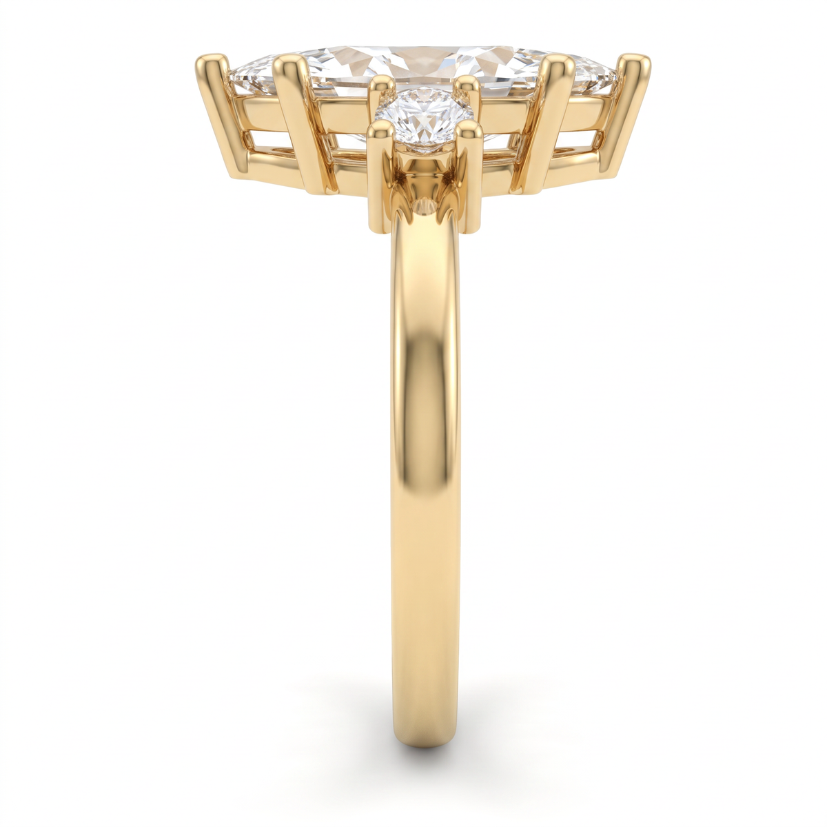 Side profile of 2ct marquise three-stone engagement ring in 14K yellow gold, round Lab-Grown Diamond side stone and double gallery under the marquise head