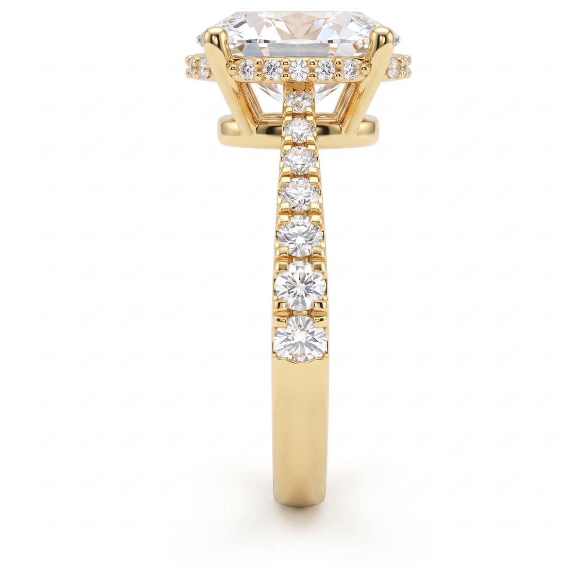 Side view of a 2ct oval engagement ring in 14K yellow gold with graduated pavé Lab-Grown Diamond band and hidden halo basket