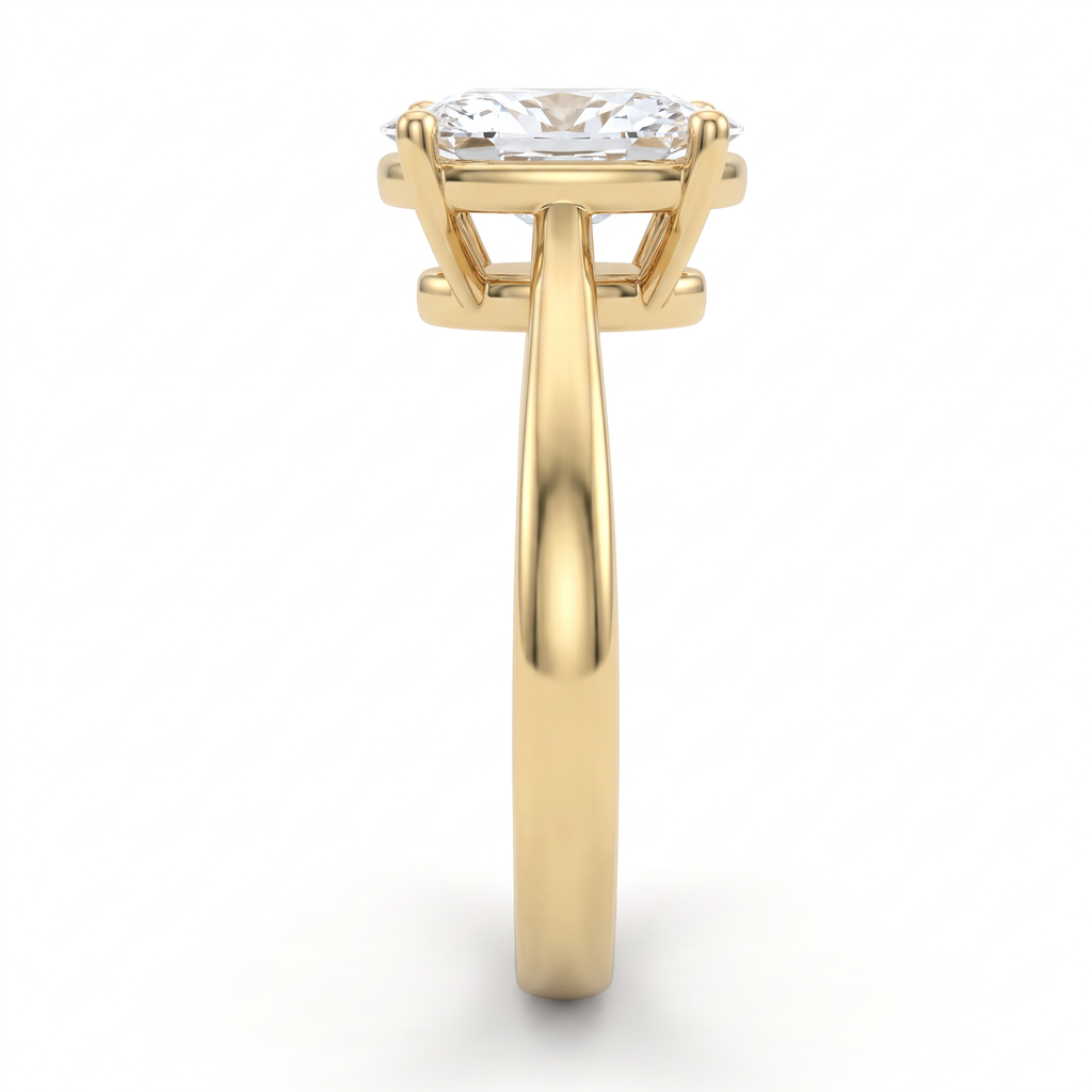 2ct oval solitaire in 14K yellow gold viewed along the 2.5mm shank, basket and gallery visible from the side