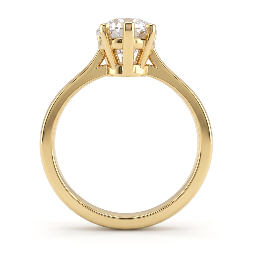 Side profile of the 2ct pear solitaire in 14K yellow gold, showing the second gallery beneath the basket