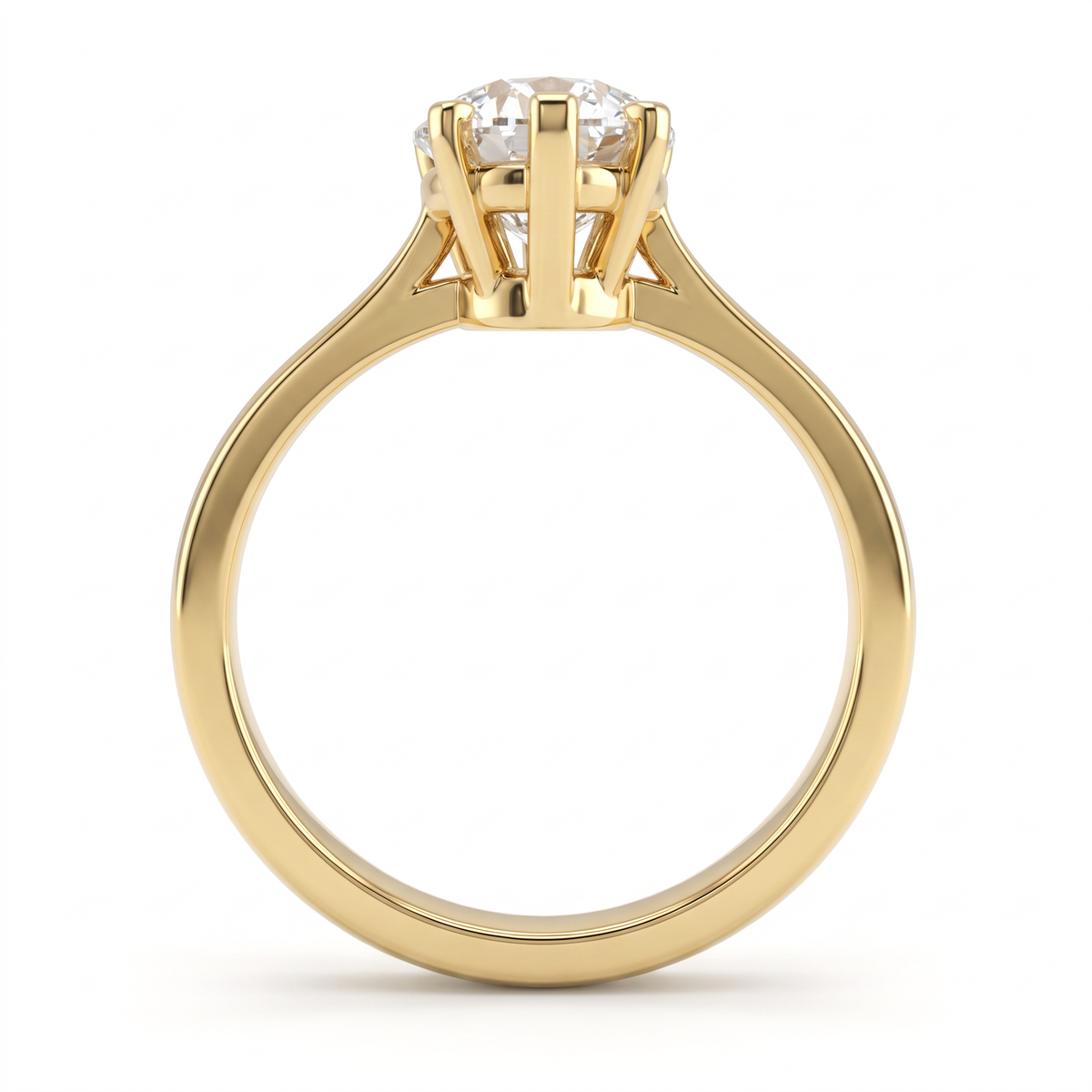 Side profile of the 2ct pear solitaire in 14K yellow gold, showing the second gallery beneath the basket