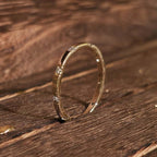Side profile of 2mm segment diamond wedding band, 14K gold, nine round diamonds (0.21 ct) – Black Pearl of Queens
