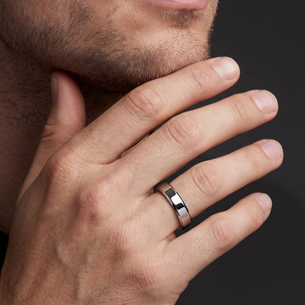 Man wearing the 5mm beveled edge wedding band in 14K white gold
