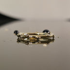 Bamboo Diamond Ring Gold in 14K, bamboo-inspired band with organic curves and petite diamonds on mirrored surface.