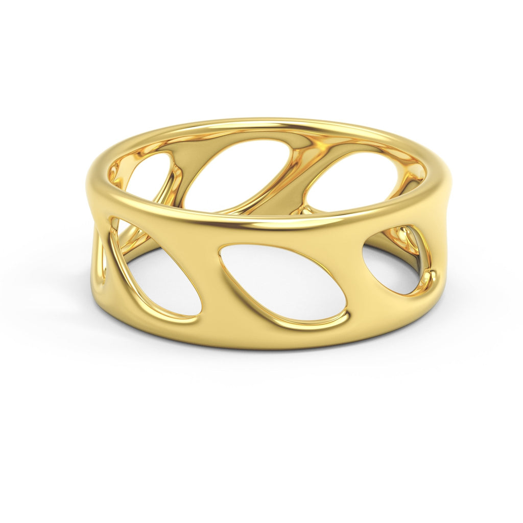 14K gold openwork olive leaf band ring on wood background