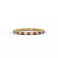Alternating ruby and diamond half eternity band in 14K yellow gold - front view